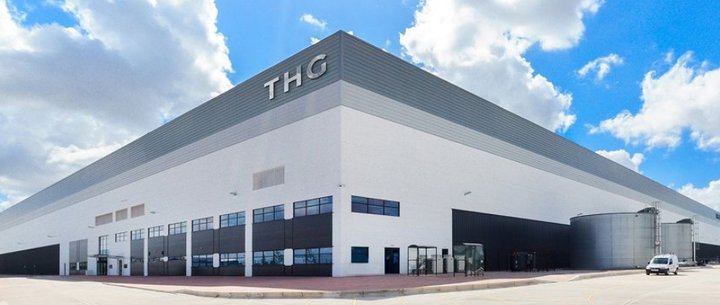 Exterior view of The Hut Group logistics warehouse and fulfilment centre building.