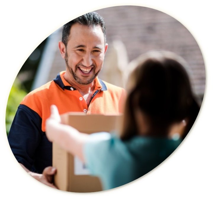 Delivery driver handing a parcel to a customer at the doorstep.