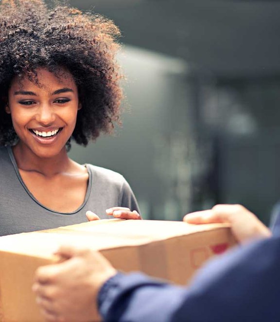 happy woman receiving a package