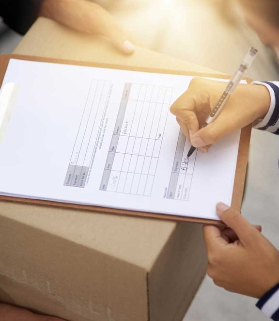 signing a package delivery