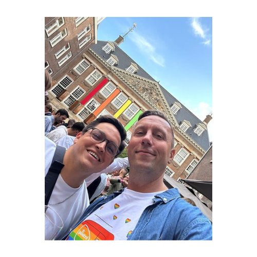 Photo of Jeroen and boyfriend at Pride