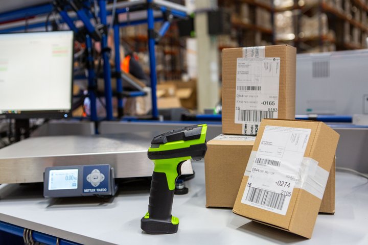 Photo of parcel scanning station.