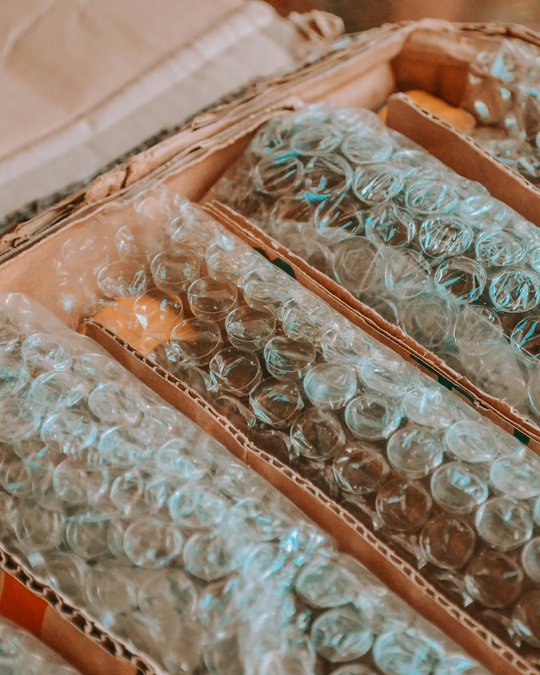 bubble wrapped items in box
