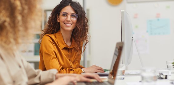 friendly woman at desk